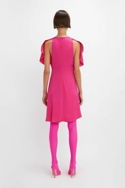 Victoria BeckhamCap Sleeve Mini Dress - Fuchsia -Viktoria & Woods shop VictoriaBeckham CapSleeveMiniDressInFuschia Pink 1123WDR004441B 2700 4050 247 WHITE LR Back Model3 JPG 1100x 8956d465 2024 4468 83f9 e7629b2fe504@2x